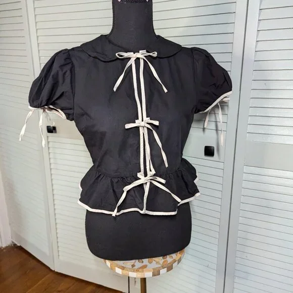 Sofie the Label black blouse with white ribbon bows - Picture 1 of 6